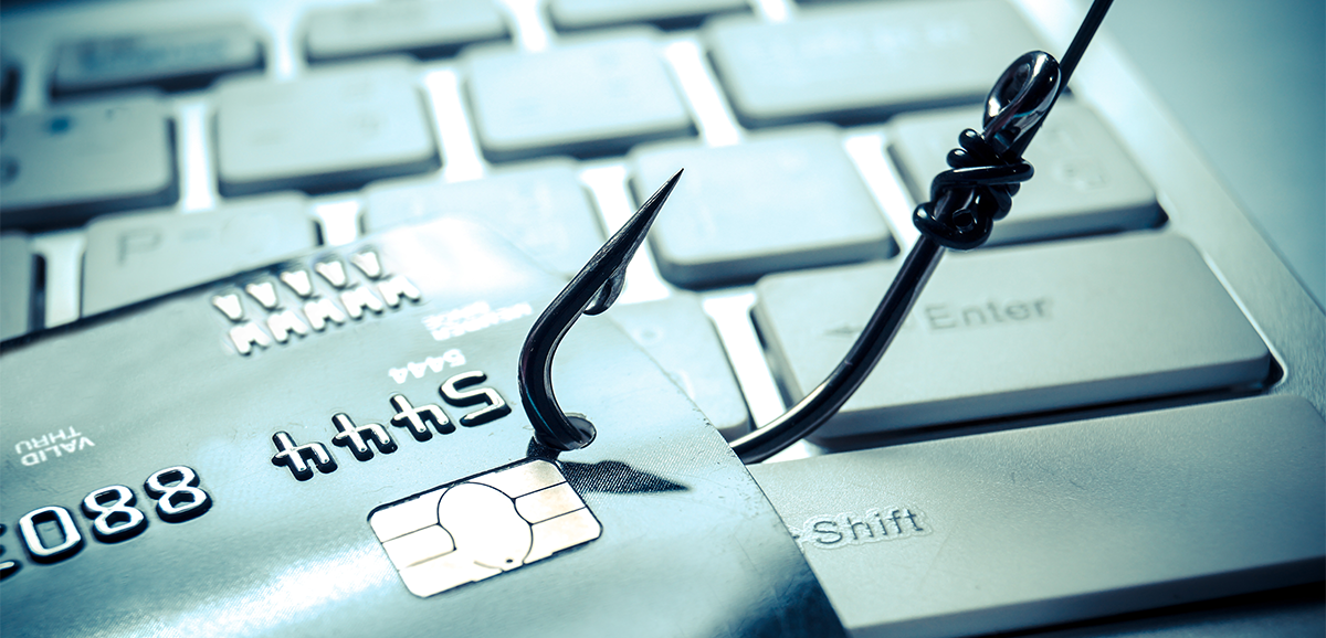 Fishing Hook Catching a Credit Card to Illustrate Phishing and How Securing Company Data is Important